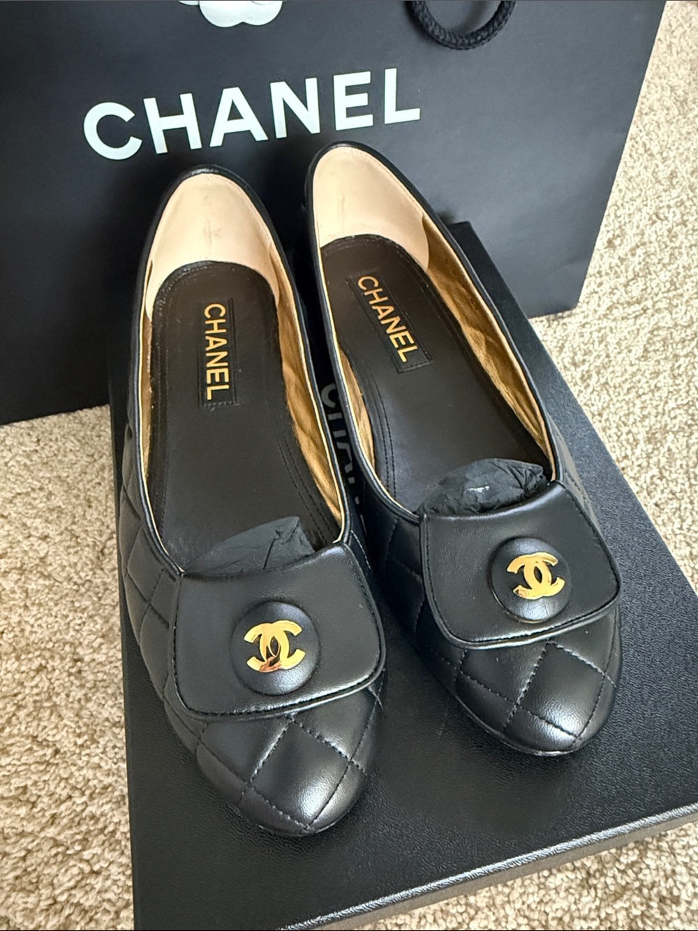 CHANEL Black Quilted Leather Ballet Flats with Gold CC Medallion